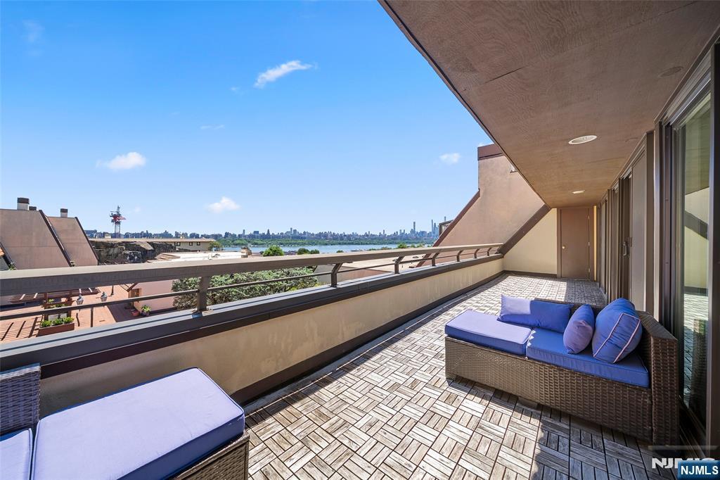 (Contact YULIYA SHINKORENKO at 2 0 1 - 3 4 1 - 7 7 7 7) - THE CLIFFHOUSE - Perched at the top of community, PENTHOUSE 62 is a spacious one-level home that spans approximately 2100-SF (including terrace & garage). It offers two bedrooms plus a versatile bonus room that can be used as a full sized office or guest room. The owner has invested significantly in replacing all the windows to enhance energy efficiency and to take advantage of the beautiful southeast views of the Hudson River and Manhattan. Gracious room sizes, private bedroom and work areas, an exceptional 33-foot river-facing terrace, fireplace, central HVAC, and a private 2-car garage complete this compelling offering. Ideally located with a NJ Transit stop directly in front of the complex, The CLIFFHOUSE has a 24-hour attended gatehouse, resident gym with sauna, and the most beautiful clifftop pool reserved for its fortunate residents. Welcome Home - (Presented by THE CHEN AGENCY, 2 0 1 - 3 4 6 - 8 8 8 8, Y u l i y a @ C h e n A g e n c y . c o m)