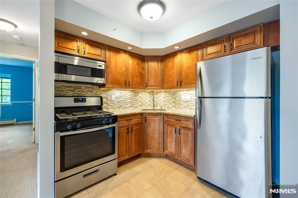 Welcome to this charming 3-bedroom, 1-bathroom condo offering the perfect blend of comfort, convenience, and value. This bright and inviting home features a spacious living area filled with natural light, a modern kitchen with stainless steel appliances and generously sized bedrooms ideal for families, guests, or a home office setup. The full bathroom is thoughtfully designed with modern touches and everyday practicality in mind. Enjoy easy, low-maintenance living with an open layout that creates a warm and welcoming atmosphere throughout. Conveniently located near shopping, dining, parks, schools, and major transportation routes, this condo is perfect for first-time buyers, downsizers. Owners must live in unit for two (2) years before renting. Donâ€™t miss the opportunity to make this well-maintained condo your next home!