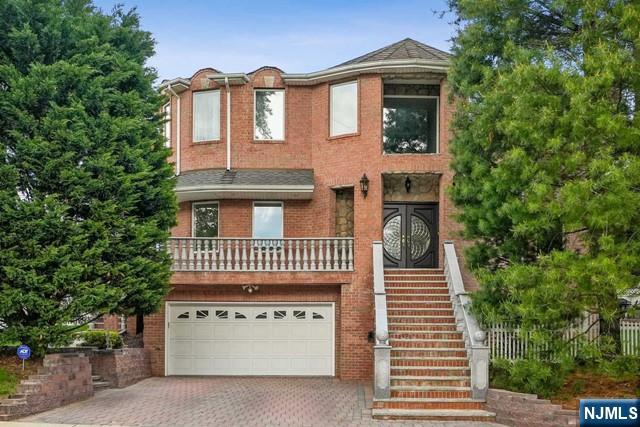Built in 2008, This Stunning property is a 6 BDRM, 4 BATH Center Hall Colonial with a Grand 2-story entry featuring a Swarovski crystal chandelier. The 1st floor offers a formal dining room and a gourmet kitchen equipped with top-of-the- line stainless steel appliances, custom cabinets and granite Countertops. The living room includes a gas fireplace, there is also a bedroom and family room on this level. Moving to the 2nd Floor, you'll find a master suite with Fireplace, Bathroom w/jacuzzi tub and walk in closet. Additionally, there are 3 more bedrooms, FBATH and Laundry room. The fully finished walkout basement features a multi-use room/family room with Dry Sauna another Bedroom and 1 a full bathroom. The back and side yards are nicely Landscaped and perfect for entertaining. This property is a MUST SEE with luxurious features throughout!