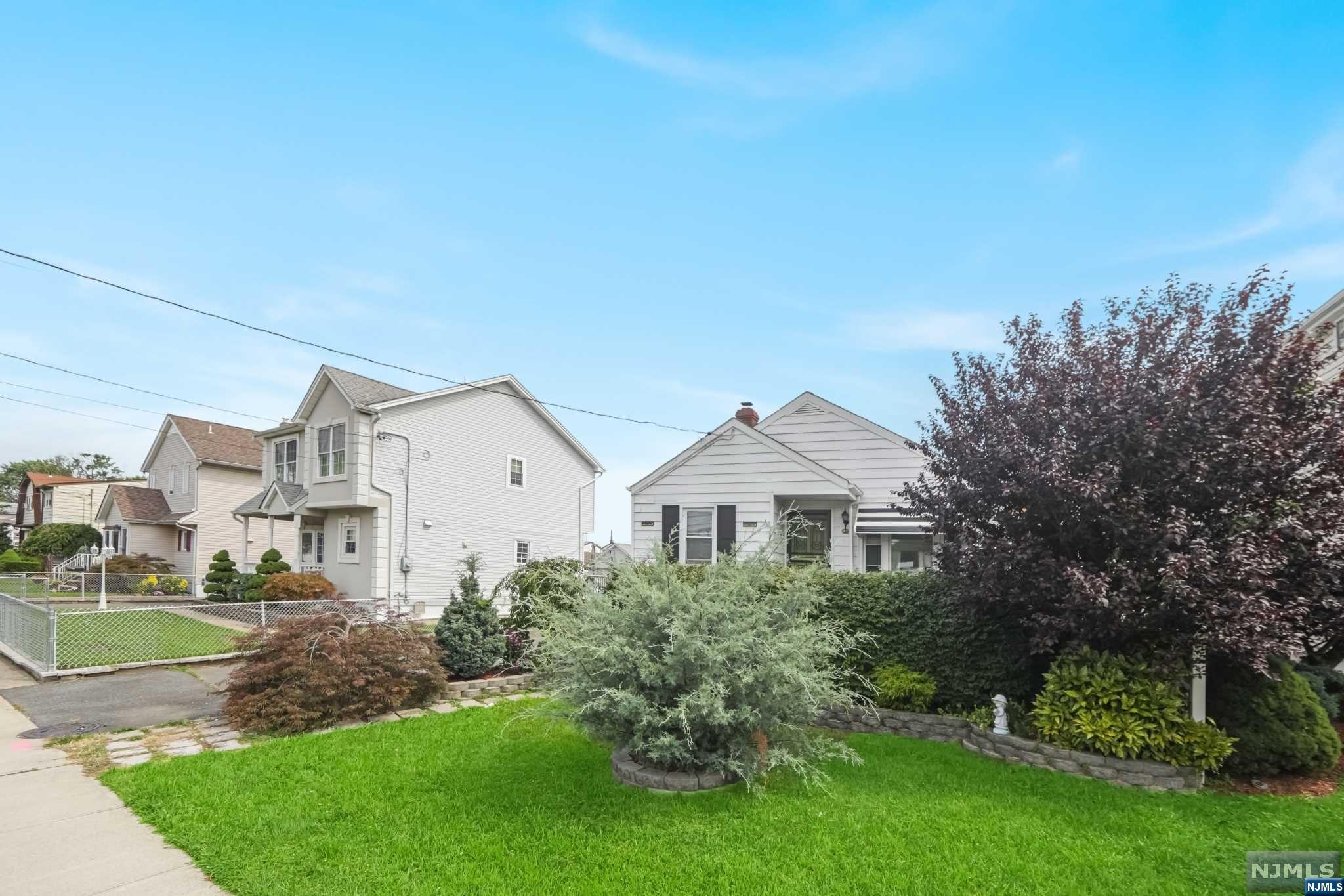 Come see this charming ranch home in Saddle Brook. This well maintained home has 1 to 2 bedrooms (you would need to put the wall back up) 1 full bath, MEIK,with newer appliances, Master Bedroom, The basement is finished with a family room, bonus room with woodburning stove and laundry room. The yard is great for entertaining! This home has a long driveway with a 2 car garage. Conveniently located to transportation, schools and shopping. Great opportunity for expansion or perfect condo alternative without HOA fees