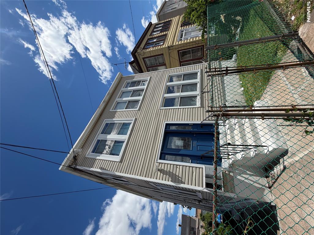 Attention Investors and First-Time Buyers! Don't miss this incredible opportunity to own a legal 3-unit property and live virtually rent-free while generating rental income. This well-maintained property features all separate utilities, a finished basement, and spacious apartments with 3 bedrooms on the first and second floors. The third-floor apartment offers 1 bedroom, providing additional rental potential. The first-floor unit is vacant, making it ideal for an owner-occupant or immediate rental. Additional highlights include a large backyard, a roof that is only 2 years old, and a convenient location close to shopping, public transportation, schools, and major highways. Excellent investment opportunity with strong income potential. Easy to show! Please call the listing office to schedule all showings.