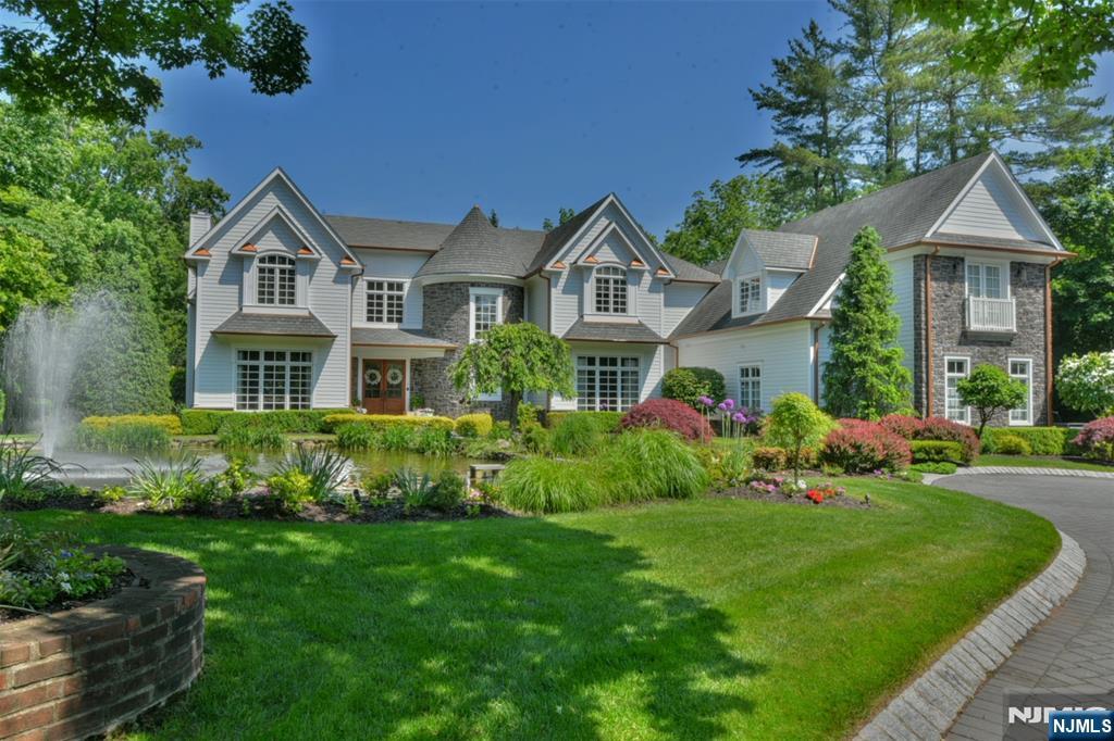CUSTOM DESIGNED DETAILS, TWO STORY ENTRANCE FOYER W BARREL CEILING HALL, SUBTLE ELEGANT HAND PAINTED WALLS & ATTENTION TO QUALITY STYLE AND COMFORT THROUGHOUT, ENJOY THE HIGH END APPLIANCES, TASTEFUL CABINETERY & SPACIOUS KITCHEN DINING AREA THAT OPENS TO A SPECTACULAR GREAT ROOM. THE GRACEFUL AND TIMELESS LIVING ROOM AND CLASSIC DINING ROOM COMPLETE THIS WINNING COMBINATION. PEACEFUL STUDY WITH KOI POND VIEWS, 2ND FLOOR, FIVE SPACIOUS ON SUITE BEDROOMS EACH WITH WIC FINISHED LOWER LEVEL, OFFERS 6TH BR ON SUITE AND AN ADDITIONAL FULL BATH, LARGE ENTERTAINMENT ROOM WITH WET BAR & BUILT-INS, GYM/BONUS RM, 2ND LAUNDRY, GENERATOR, GUNITE SALT WATER POOL, 3+ CAR GARAGE, ANTIQUE RENOVATED BARN W/ ORIGINAL 100 YEAR OLD BEAMS. ONE OF A KIND PRIVATE PROPERTY.