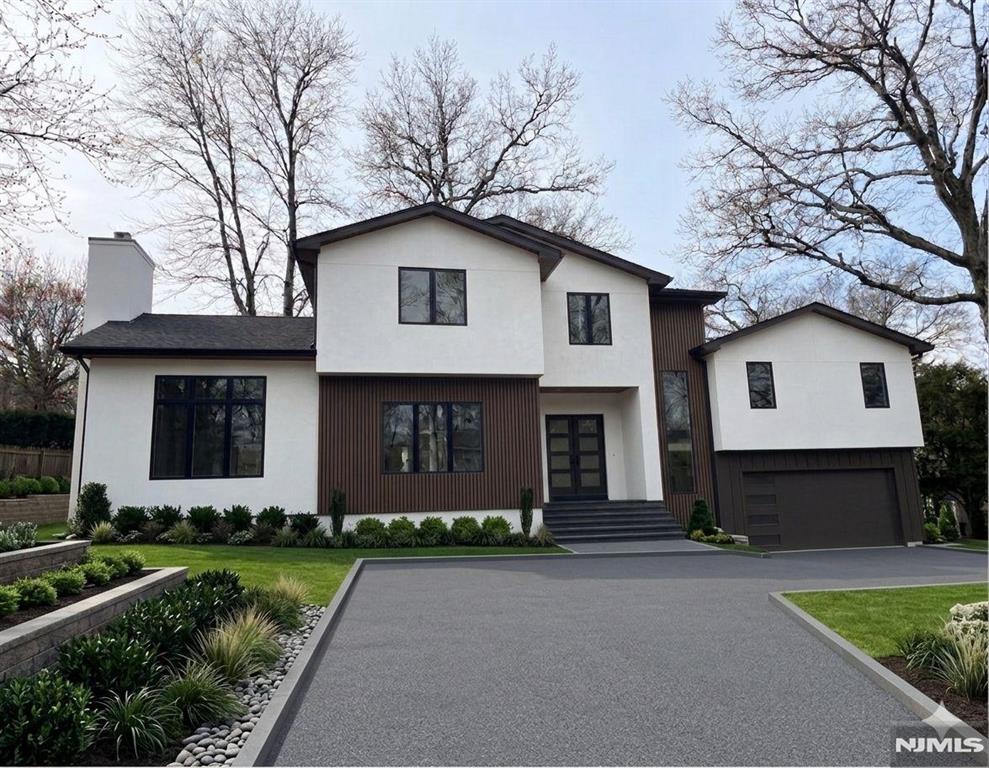 Stunning new construction comprised of 5 bedrooms and 4.5 bath ideally located near schools, transportation and town center. Experience luxury and convenience living with great south facing rear yard great for relaxation and entertainment. Enjoy the privacy of a separate primary bedroom, second floor laundry room, expanded family room with 12 foot high ceiling and an expanded basement with a bedroom, full bath, recreation area and tv room. Excellent choice for a family.