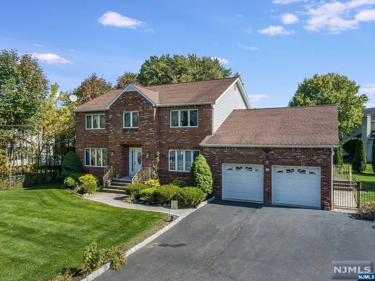 The Model Home for one of Wayne's Premier Neighborhoods, the Prestigious Black Oak Estates. A truly Majestic Brick Front Center Hall Colonial, boasting over 3000+ SF of living space. Step inside the home's entry foyer w/ direct access to the FAM RM, 2nd FL stairs, KIT, and DR. Left of foyer is a large FAM RM feat HW fls, & 2 sets of French drs separating the space from the entry foyer & LR. Right of the foyer is the DR w/ HW fls, offers French drs off foyer, and ideally opens to the KIT. The Large Kitchen includes a sep dining area, & also displays an abundance of cabinet storage, & lots CT space for preparations. The Spacious LIV RM sits adjacent to the KIT and includes HW fls, & a wood burning fireplace perfect for the coming winter! Access to back deck available from LR. 1st Fl also showcases the LNDRY RM, A FB w/ shower & bidet, & the 5th BR/home office w/ private entrance. Could be potential in-law suite as well. Per NJACT, home is zoned for Residential/Business.
