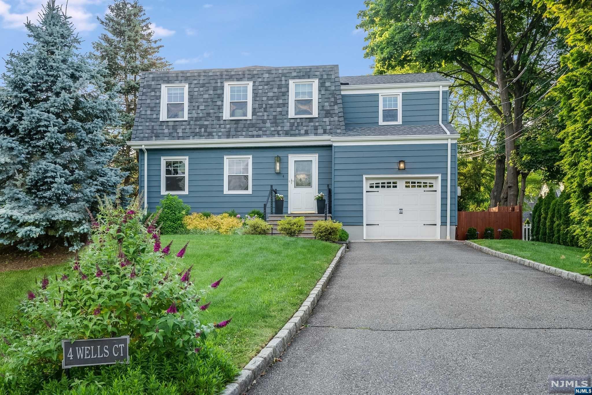 Proximity meets privacy with this meticulously maintained cul-de-sac colonial with large bedrooms and the perfect backyard. Starting with location, you are in the heart of the GR Historic District, just .7 miles to the GR train station, and only .5 miles to Bloomfield station, shops & restaurants. Leading to the dreamy backyard, you have a wood privacy fence, with a 28 foot wide deck, mature landscaping, and a custom brick patio with fire pit and built-in Lynx grill station. The first floor plan flows from the living room to the kitchen & dining room seamlessly. Blissful views of the backyard complement the attached garage, powder room & kitchen pantry also on this first floor. Downstairs, you have a finished basement with rec room, laundry room, and storage closets. Upstairs, you have three large bedrooms with two full bathrooms, including a primary en-suite. With a new roof (2023/2024), new HVAC (2023), and newer sewer (2017) this home is as easy to enjoy as it gets.