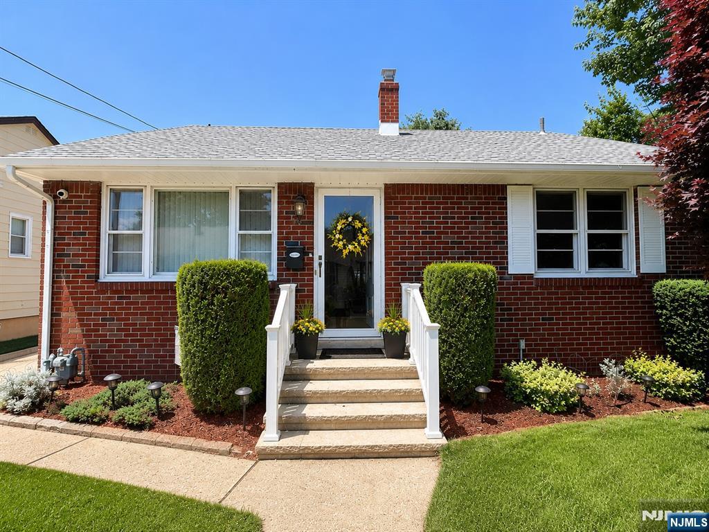 Welcome to this meticulously maintained 2-bedroom ranch offering comfortable one-floor living with exceptional additional space below. Thoughtfully cared for throughout the years, this home combines functionality, flexibility, and convenience. The main level features a bright and inviting living room, formal dining room, an eat-in kitchen, two spacious bedrooms, and a full bathroom. A large sliding glass door fills the home with natural light and leads to a covered patio, creating the perfect setting for outdoor dining, entertaining, or simply enjoying your backyard. The fully finished basement significantly expands the living space and offers endless possibilities. Complete with a fully equipped summer kitchen, full bathroom, and a large open-concept area, itâ€™s ideal for a family room, recreation space, home gym, media room, or entertaining. A separate office/project room combined with the laundry area provides additional flexibility for todayâ€™s lifestyle. Outside, youâ€™ll appreciate the professionally landscaped grounds, front and rear sprinkler system, detached garage, and a driveway accommodating up to three vehicles. A mobile gas-powered generator that connects directly to the homeâ€™s electrical panel provides added peace of mind during power outages. Conveniently located near shopping, restaurants, schools, public transportation, and major highways; Routes 17, 46, and the GS Parkway, this home offers the perfect balance of comfort, versatility, and accessibility.