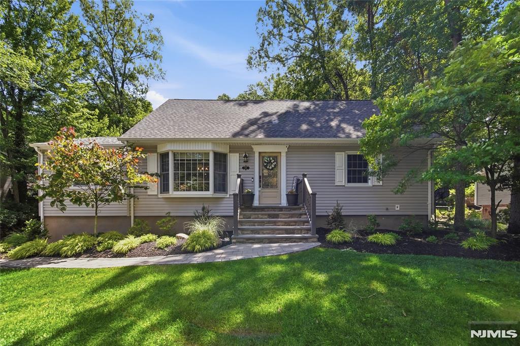 For a private showing please contact Gary @ 201-647-4225. A neighborhood lined with trees, kids riding bikes and playing ball; this is the lifestyle you buy into at 49 Skytop Drive in Fardale. You will enjoy an updated home with an open floor plan ideal for entertaining. A new eat in kitchen with large center island is open to the large dining area. The family room offers a gas fireplace with access to the new Trex deck. 2 spacious bedrooms and an updated full bath complete the first level. The 2nd floor offers 2 additional bedrooms and an update full bath. The backyard is an oasis with a new Trex deck a Mary Grove retractable awning, kidney shaped fiberglass heated pool, and pergola. The yard is fenced with lots of green space to play. The 2 car garage is spacious and enters into the basement level which can be finished into a great playroom, gym, etc. Enjoy all that Fardale has to offer with close proximity to downtown Ramsey, Allendale, Boulder Run in Wykoff, houses of worship, daycare, and so much more. Please note some photos have been virtually staged/enhanced to give buyers a visual of the room's potential.