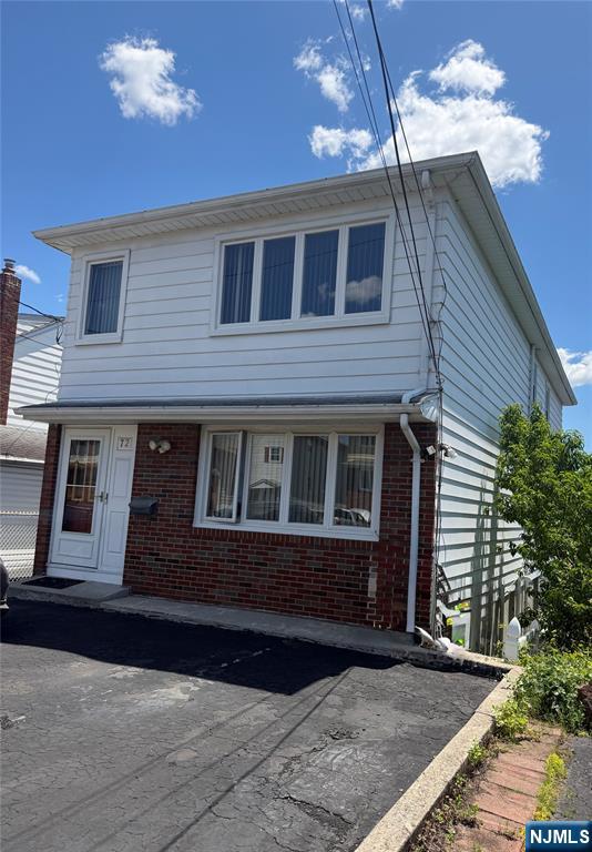 Exceptional opportunity to own this well-maintained two-family home, ideal for both owner-occupants and investors alike! Each spacious unit features 2 bedrooms, a bright living room, formal dining room, and an eat-in kitchen, offering comfortable and functional living spaces.The fully renovated basement provides additional versatile space and adds tremendous value to the property. Whether you're looking to live in one unit while generating rental income from the other, or seeking a strong addition to your investment portfolio, this property checks all the boxes.Conveniently located near shopping, schools, parks, public transportation, and major highways, this income-producing property offers endless potential. Don't miss this fantastic opportunity!
