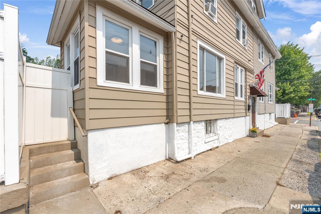 A Private Retreat Just Minutes from Manhattan! Welcome to this beautifully maintained 4-bedroom, 2-bath half-duplex in the desirable Cliffwood section of North Bergen. This warm and inviting home offers a spacious, functional layout filled with natural light, featuring a private third-floor primary suite that provides the perfect retreat, along with generously sized bedrooms. Step outside to your beautifully landscaped backyard, perfect for entertaining, relaxing, or enjoying your morning coffee. A detached one-car garage and additional storage add everyday convenience. Ideally situated on the same street as the highly regarded Robert Fulton Elementary School, this home is also just minutes from Braddock Park, Boulevard East, shopping, dining, and public transportation, making commuting to New York City quick and convenient. Whether you're a first-time buyer or simply looking for more space in a fantastic neighborhood, this home offers comfort, convenience, and an exceptional opportunity to own in one of North Bergen's most sought-after locations.