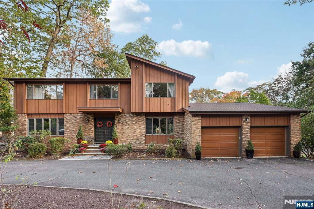 If you are looking for a peaceful, serene location to reside in, you will find it at 76 Church Street in prestigious Alpine. You can relax reading a book in front of your fireplace in the cozy den or entertain guests in the large fully updated lower level, complete with a kitchen. This room also walks out to a spacious backyard area, where you can go for a dip in the pool on a hot summer day or just relax around it. Large family, no problem. This home features 6 bedrooms and 4 and one half baths.
