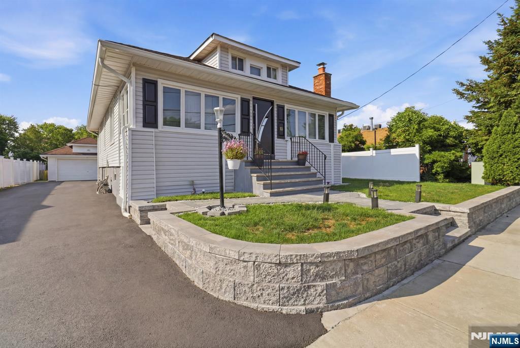 Recently updated and move-in ready, this beautifully maintained home offers the perfect blend of modern finishes and everyday comfort. Featuring 3 spacious bedrooms, 2 full bathrooms, beautiful hardwood floors, a bright and inviting living area, an updated kitchen and bathrooms, a finished upper level providing additional living space, and a fully finished basement ideal for a recreation room, home office, or extra storage. Step outside to enjoy a spacious backyard perfect for entertaining, relaxing, or outdoor gatherings, along with an oversized driveway offering ample parking and a detached 2-car garage. Conveniently located near parks, schools, shopping, restaurants, major highways, and public transportation, this home offers exceptional comfort, convenience, and value. Don't miss this fantastic opportunity!