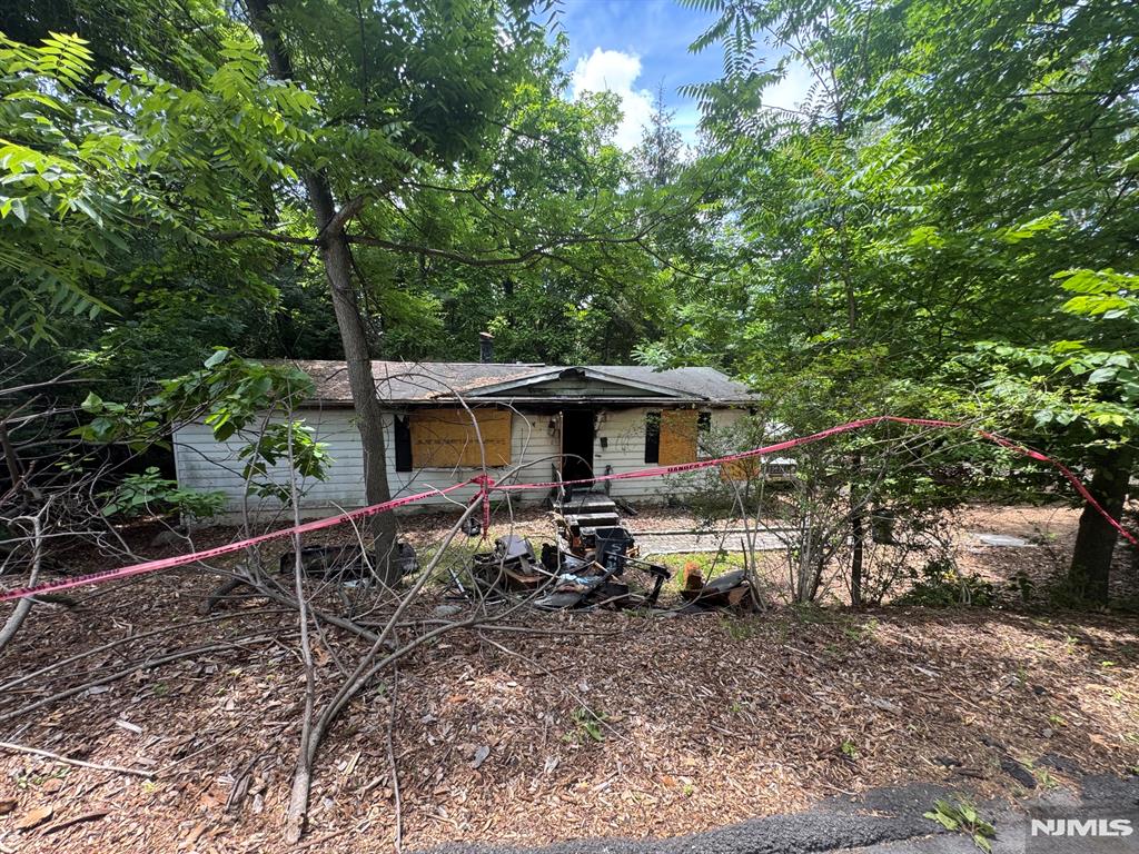 House had a fire. Not safe to walk property without an appointment. Buyer to do their own due diligence. Seller does not have any current engineering. Foundation size is 24 X 48 ft. Commuter train line along the back of property. Town gave owner 10ft along the back of the property. Survey attached does not reflect the extra 10 ft.