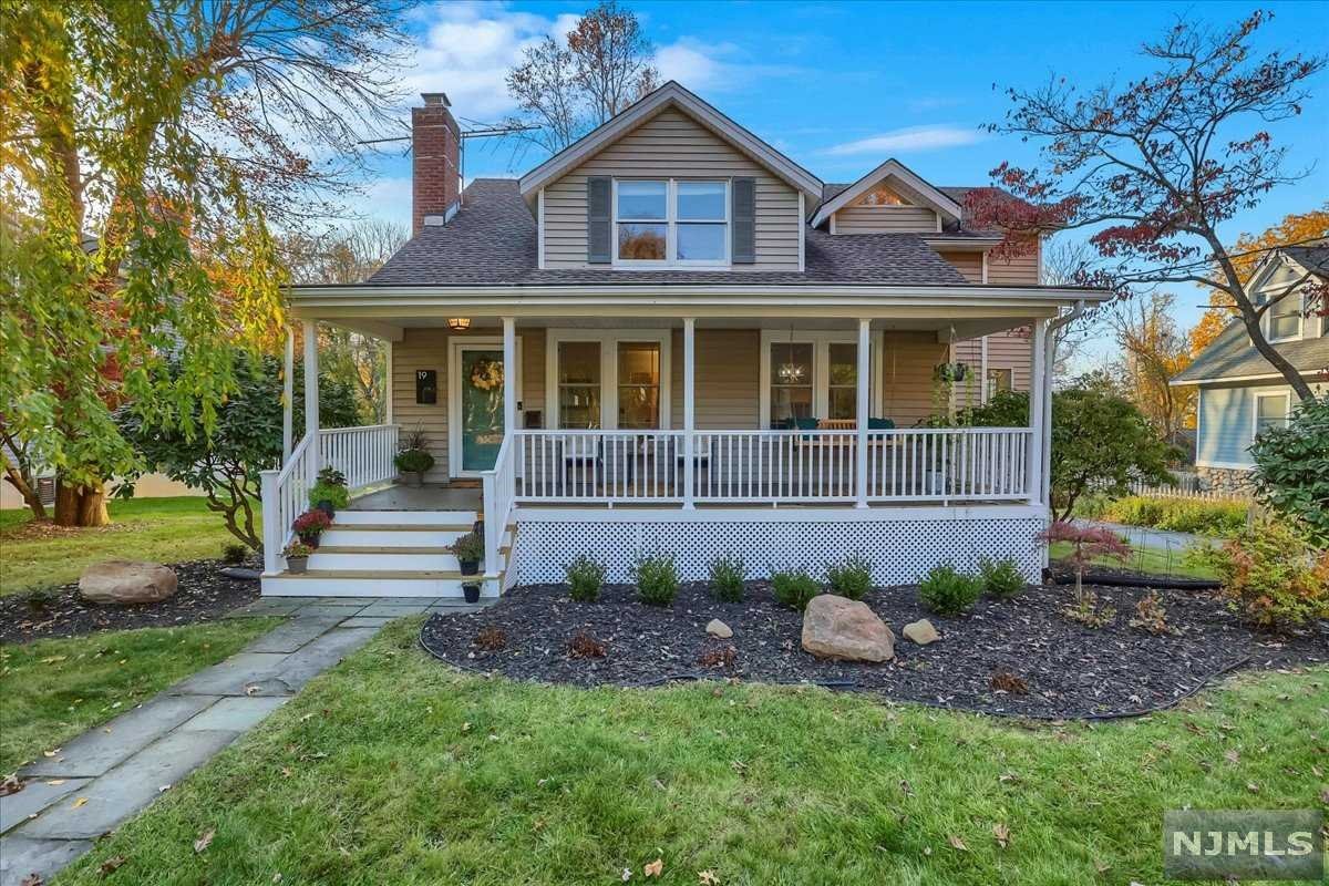 When you arrive, it is easy to imagine sitting on the front porch, watching the buzz of small-town life or taking a stroll to the nearby downtown shops, schools and restaurants. This feels like home the moment you walk through the door. You are greeted by a beautiful living room with hardwood floors and a fireplace flowing to an open den/dining room. In the newly renovated kitchen there is stunning finishes, a bar w/wine fridge and room for a large table. This creates a perfect space to entertain. Off here is an updated half bath. Down the hall you will find a first-floor master bedroom with full master bath and a huge closet. Upstairs you will be surprised by 3 spacious rooms as well as a full hall bath with double sinks. The basement offers high ceilings and is just waiting for your final touches. On the exterior the large property and covered patio offer yet another space to entertain and unwind. Homes in locations like this do not come up often! Don't miss this one!