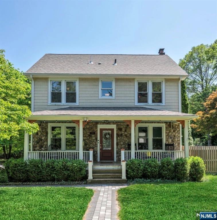 Welcome to this enchanting property set on nearly half an acre in Pascack Hills! A large and bright entry foyer sets the tone upon entering this charming center hall colonial. At the heart of the home, the living room offers a large comfortable gathering space with a fireplace, bay window, and French doors. This flows seamlessly into the formal dining area with gorgeous coffered ceilings. The kitchen opens to a light-filled breakfast nook with high ceilings that truly open up the space. The exposed brick accent wall is a warm touch along with the views of the peaceful backyard and beyond. Upstairs offers a generously sized front to back primary bedroom accompanied by two additional bedrooms and a full bath. A fourth bedroom, bonus room and second full bath present an opportunity to create a private primary suite or flex space on the third floor. The basement holds endless potential to customize something thatâ€™s uniquely your own. Upon entering the backyard the grapevines and pond provide a serene setting, while access to the 3 garage spaces add convenience and functionality. Recent improvements include a new roof and HVAC (2024), hot water heater(2026) and more! Combined with Montvaleâ€™s Blue Ribbon schools, vibrant downtown and convenient train access, this home presents an exceptional opportunity to live in one of Bergen Countyâ€™s most sought after communities!