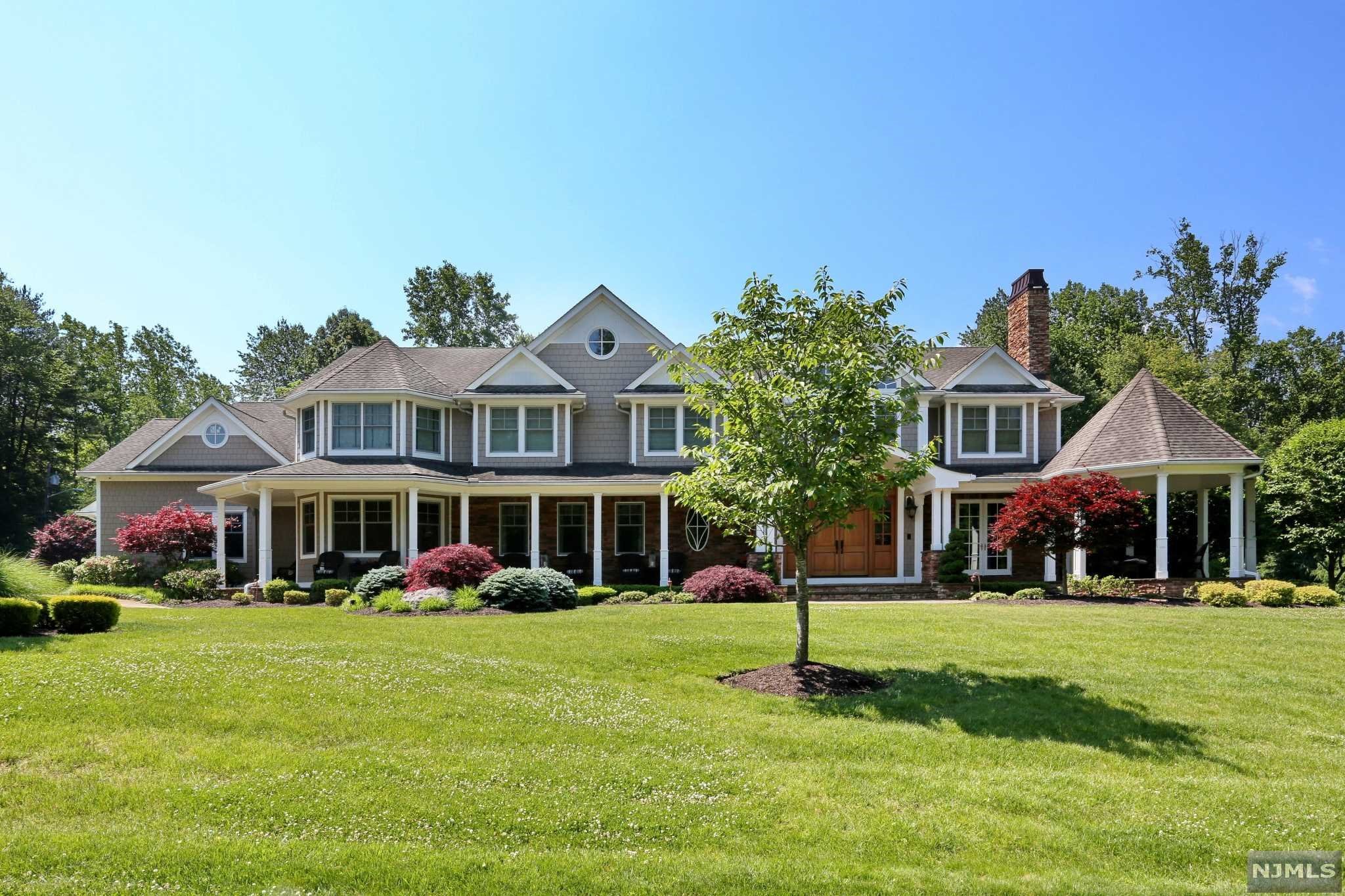 COME AND VIEW THIS SPECTACULAR AND ONE OF A KIND,5B5,6.5 BATH, CUSTOM COLONIAL. BUILT NEW IN 2010 BY ONE OF BERGEN COUNTIES PREMIER BUILDER FRANK INSERRA. NO EXPENSE SPARED!! TOP OF THE LINE AMENITIES & CONSTRUCTION THROUGH OUT. OVER 10,000 SQ.FT WITH FINISHED BASEMENT. ENTER FROM THE COVERED FRONT PORCH INTO THE 2 STORY FOYER, LIBRARY/FPL, FULL GLASS SOLARIUM O/E TO YARD, POWDER RM, GOURMET EAT IN KITCHEN, 2 STORY GREAT RM/FPL, BANQUET SIZE FORMAL DINING RM, GUEST BR/FBTH, SIDE MUD RM WITH LAUNDRY RM/PET BATH, 4 CAR ATTACHED GARAGE ENTRY. 2ND.FLOOR MBR SUITE/FPL, H.&H. WI.CL.2ND.LDRY RM, BR/BTH/JAC&SS,BR, BR/FBTH/JAC&SS, WALK UP FIN.ATTIC. THE BASEMENT OFFERS A LG.REC RM, FBTH/STEAM SS, GAME RM/WET BAR, GYM, POOL CABANA FBTH/SS,UTIL&STG. THE MAGNIFICENT ACRE+ PARK LIKE PROPERTY HAS A FREE FRM SALT WATER POOL WITH SPA AND OUTDOR KITCHEN SHOWS LIKE A RESORT WITH TOTAL PRIVACY. THIS CUSTOM HOME HAS BUILT INS THROUGH OUT AND WILL BE A PLEASURE TO SHOW. A MUST SEE HOME!!!