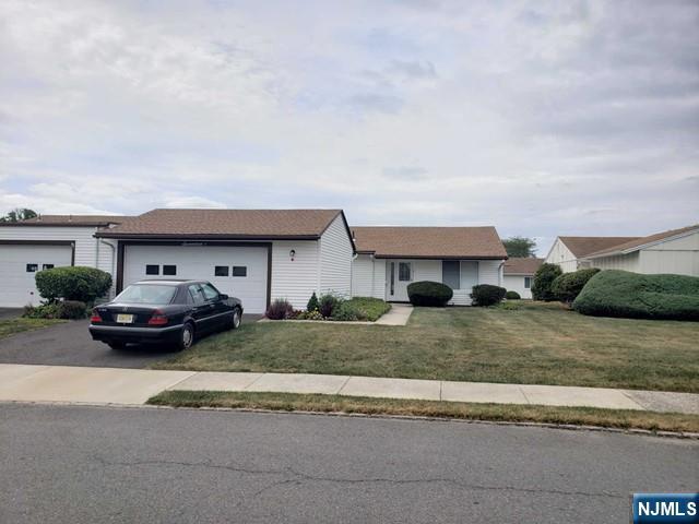 This beautiful remodeled 3BR/2Baths Ranch( Braeburn Model ) in Sought after Clearbrook 55+ Adult community of Monroe. The home features a Totally renovated Open Floor Plan w/ Custom Modern Kitchen w/ Center Island, Granite Countertops, Tiled Backsplash, Custom Cabinets, SS Appliances, Beautiful Crown Moldings Throughout, Tons of LED Recessed Lighting, Gleaming Hardwood Floors Throughout, primary BR w/ En-Suite Bath w/ Glass Enclosed Shower, Ceiling Fan, Second BR w/ Ceiling Fan, Sunroom w/ Newer Wall A/C & Heat w/ Ceiling Fan, Tiled Floor and Sliding Glass Door to Patio, Washer & Dryer in Unit. Newer Roof and Newer A/C. Large 2 Car Garage w/ Storage Space, Community Offers Many Amenities: Golf Course, Stunning Club House featuring a Pool, Bocce, Billards, Art Room, Ball Room, Card Room, 24-hour Gatehouse Security, Great Location. This Home is Move-in Ready. Price Reduced by $30k for quick sale, seller is motivated, don't lose this opportunity!