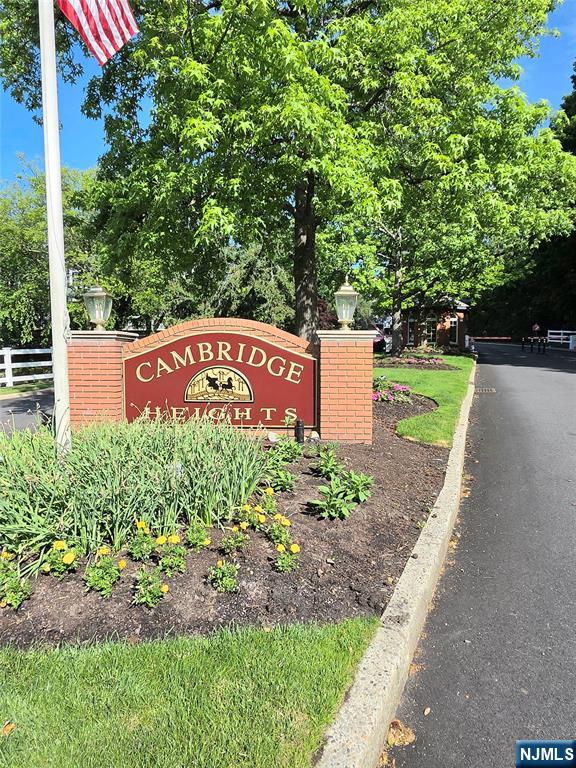 Welcome home to this rarely available, renovated 1 BR condo in the sought-after gated community of Cambridge Heights! This desirable corner unit has an additional window in the bedroom, bringing in significantly more natural light than most other units. This bright, spacious 1st floor condo has been updated extensively. The open-concept kitchen has been renovated in 2026 with all new stainless steel appliances, new flooring, new quartz countertops, new quartz breakfast bar & new sink! The generously sized living and dining area provides plenty of room to relax or entertain and features sliding glass doors that open to the patio. The BR is also very spacious with double closets and its own entrance to the full bathroom. The bathroom was recently renovated in 2026 with new flooring, a new vanity, reglazed shower, tub, and tile, new frameless glass door, all new fixtures, new light with exhaust fan, new LED mirror, toilet accessories & fresh paint. Additional updates in the home include new flooring (2022), new HVAC (2022), new water heater (2022), new paint throughout (2022), new paint (all white & some grey)(2026), new LG washer/dryer (2023), new door hardware and additional finishing touches throughout the home! The home includes two conveniently located parking spaces in the upper parking lot. It's an easy walk to the pool, gym, and tennis courts. Don't miss it! Zillow property taxes are incorrect. Current annual taxes are $6,593. Confirm with the municipality.