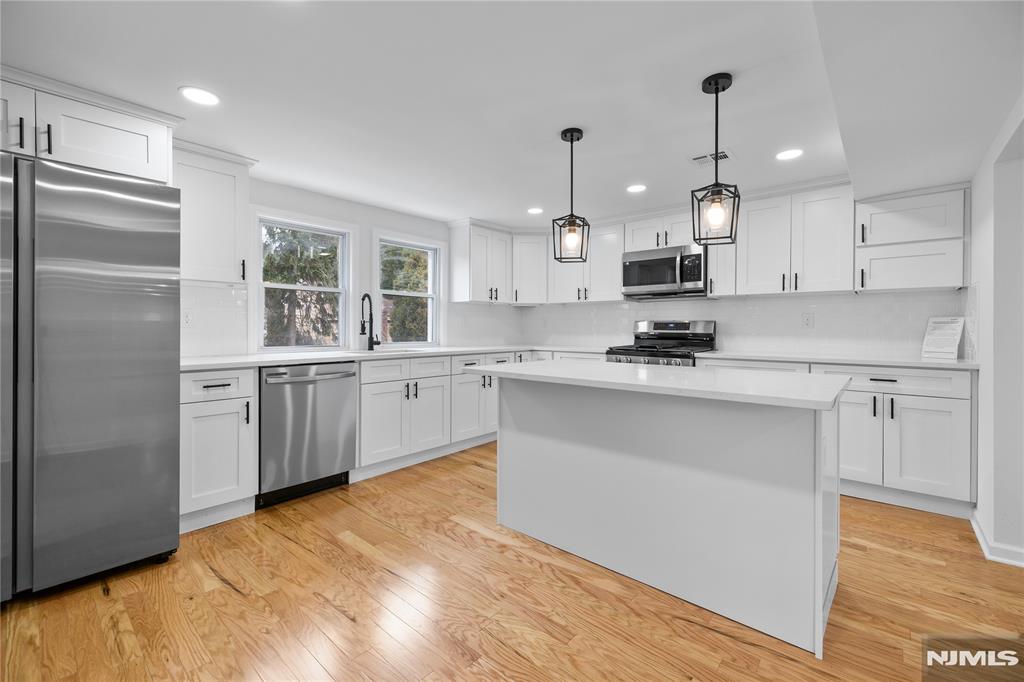 Beautifully renovated 4-bedroom, 3-bath home featuring hardwood floors, abundant natural light, an updated kitchen with new appliances, and a finished basement with a full bath offering flexible living space. Enjoy a spacious backyard, central air, and a functional layout designed for everyday living and entertaining. Convenient Verona location with easy access to shopping, dining, parks, schools, and major highways.
