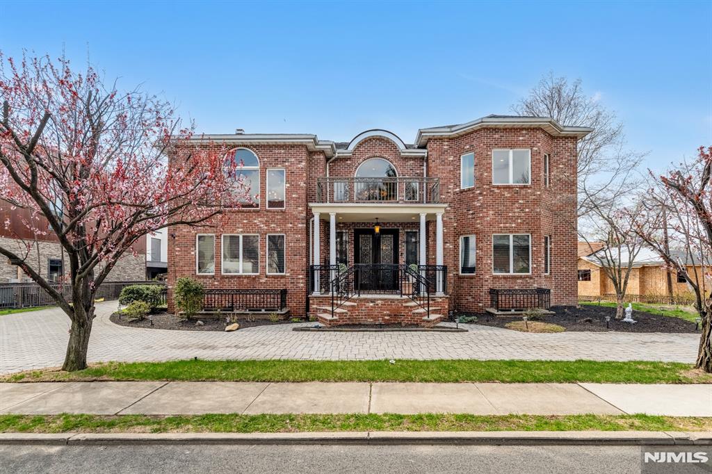 Situated in Cliffside Parkâ€™s most coveted location & offering sweeping views of the NYC skyline, this Mediterranean-style estate is the pinnacle of elegance & contemporary luxury. Featuring 6 spacious bedrooms & 7.5 impeccably designed bathrooms, the home blends sophisticated living with everyday comfort. Crafted with timeless detail, the interiors showcases wrought iron accents, rich hardwood finishes, & natural stone, creating a warm atmosphere throughout. The gourmet kitchen stands as the heart of the home as a true culinary sanctuary. Versatile 1st bedroom with en-suite bath offers ideal accommodations for multigenerational living. Expansive finished basement is your personal oasis with a sleek lap pool, elegant bar, and a temperature-controlled wine cellar. State-of-the-art sauna elevates the experience. This remarkable residence delivers luxury at every turn, with quick access to NYC and all that Cliffside Park offers including dining, shopping, and culture.