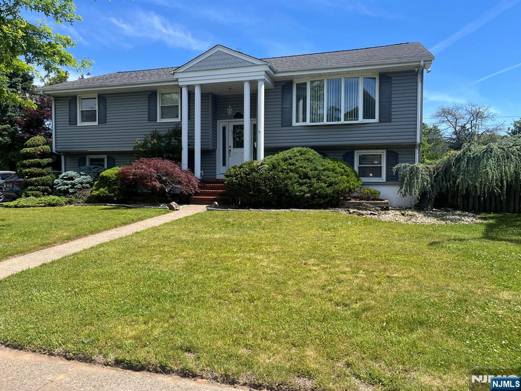 Beautiful and stunning house on great location. just a few minutes to the public schools even on a quiet street. Fenced-in Garden Oasis featuring 2 large ponds with water falls. 4bedrooms and 3 full baths bi-level home with all hardwood floors and 2 car garage and 6 cars driveway. 132 width and 95 depth lot. Enjoying a large deck and patio.