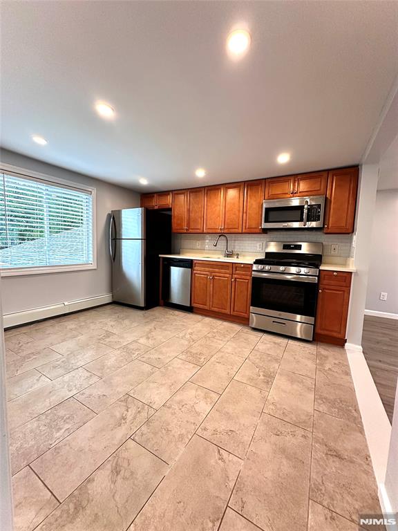 Move into this updated two bedroom apartment located in one of the most desirable areas, Hillcrest Section in Paterson! The apartment has been recently updated with new paint and new floors. Know that you'll have the convenience of having extra storage space in the attic as well as a new washer & dryer in the unit! No need to worry about parking, this apartment comes with two assigned parking spaces. Pets are conditional.