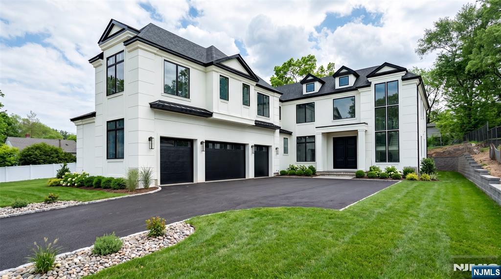 Brand new construction, new foundation masterpiece in the heart of Paramus. Built by Gold Coast and designed by Allison Handler Design, this exceptional residence showcases impeccable craftsmanship, designer finishes, and thoughtfully curated living spaces throughout. Featuring 7 bedrooms and 7.5 bathrooms, the home offers the perfect blend of luxury, scale, and everyday functionality. A grand entrance foyer sets the tone for the impressive interior. The chefâ€™s kitchen, complete with an additional prep kitchen, features custom modern cabinetry, a waterfall island, and a premium Sub-Zero and Wolf appliance package, all seamlessly open to the great room with a gas fireplace. A first-floor bedroom suite adds flexibility and convenience. The stunning primary suite is a true retreat, offering an expansive layout with two oversized custom walk-in closets and a spa-inspired bath featuring a soaking tub, oversized glass shower, and luxurious designer finishes. Additional highlights include custom millwork and accent walls, a fully finished lower level with a theater, bedroom, recreation area, gym, and full bar. Equipped with multi-zone HVAC, integrated speakers, designer lighting, and extensive custom closets, this newly constructed luxury home delivers elevated modern living in one of Paramusâ€™s most desirable locations.