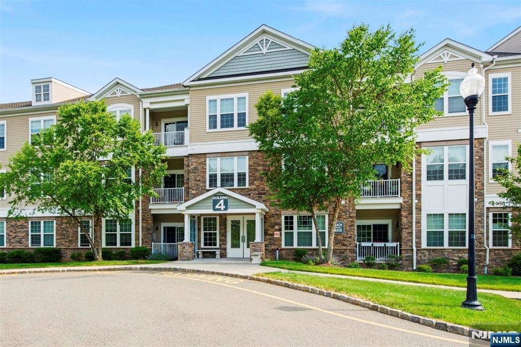 This sought after Ramapo model is located in the 55+, Greenbriar at Fox Ridge community. This lovely 2 bedroom, 2.5 bath unit offers 1680 Sq Ft of living space with gorgeous cherry wood cabinetry, granite countertops, stainless steel appliances, and a breakfast bar opening to the dining area and spacious living room with wood floors. Just off the living room is a balcony and an additional sitting room/office. The large primary suite has two walk-in closets, a sitting area and a large primary bath. The second bedroom has a walk-in closet and an ensuite bath. A laundry room with a full sized washer and dryer is complete with a utility closet, shelving, and racks for extra storage. This unit has a garage parking space and a 10"x10" storage area. Residents enjoy an active lifestyle. The beautiful clubhouse includes both indoor and outdoor pools, a fitness room, art studio, game rooms, and meeting areas. Additional amenities include a covered picnic pavilion with gas grills, tennis, pickle ball, bocci ball, a community garden and walking paths. This well maintained, resort-like community is located close to shopping, and major highways.