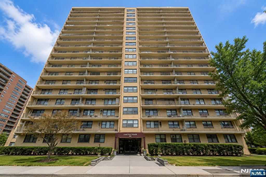 Welcome to Carlton Tower, Passaic Park's premier full-service high-rise. Perched on the 22nd floor, this beautifully updated one-bedroom residence offers breathtaking panoramic views from a newly refurbished 30-foot private terrace, overlooking lush, tree-lined residential neighborhoods with sweeping vistas extending to the New York City skyline, including Midtown Manhattan and Long Island City. Freshly painted throughout, the home features a newly renovated kitchen, tastefully updated bathroom, and a bright, open layout filled with natural light. Building amenities include a 24-hour doorman, seasonal outdoor pool, fitness center (membership required), BBQ area, on-site laundry, and available parking. Monthly HOA includes electricity, heat, hot water, and all utilities except cable and internet. Ideally located in the highly desirable Passaic Park section, just minutes from shopping, dining, major highways, NYC transportation, houses of worship, and parks. A rare opportunity to own a move-in-ready home with spectacular skyline views in one of the area's most sought-after buildings.