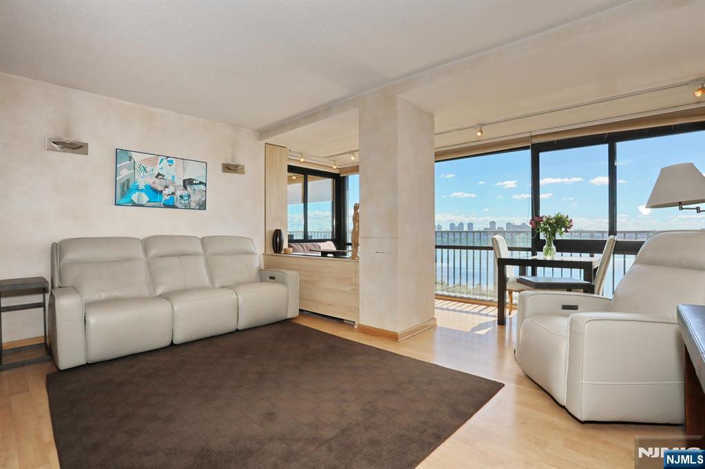 Why rent when you get all this including a million dollar view? Large Jr. 1 BR apt with separate bedroom and additional interior space from permanent terrace incorporation into the LR and BR. Updated kitchen, brand new floors (not featured in photos), updated full bath with new bathroom vanity, great closet space and built-ins. Building amenities like fitness room and on-site laundry, ownership includes access to the 2 pools (one with kiddy pool and one with hot tub), tennis and pickleball courts and the use of any of the 6 building fitness rooms. Full time on-site management, 24/7 door-person, 24/7 security and 30 acres with walking paths, BBQ area, childrenâ€™s playgrounds and benches around the property to sit and enjoy the views. Maintenance includes property taxes, UL mortgage (both tax deductible), utilities, water, cable TV/internet, parking and amenities. Corporation requires 25% down and 4:1 debt to income ratio. $404.89 monthly maint., $573.04 tax, UL mort, utilities, insurance, $237.50 cap assessment, $105.60 garage pkg, $71.54 Spectrum cable tv/internet, $20 amenity fee. Total maint. $1412.57/month. Board approval required, gross income for cash buyers with no debt must be approx. $67,800 per year. Showings by appt. only, call Susan 201-370-6407.