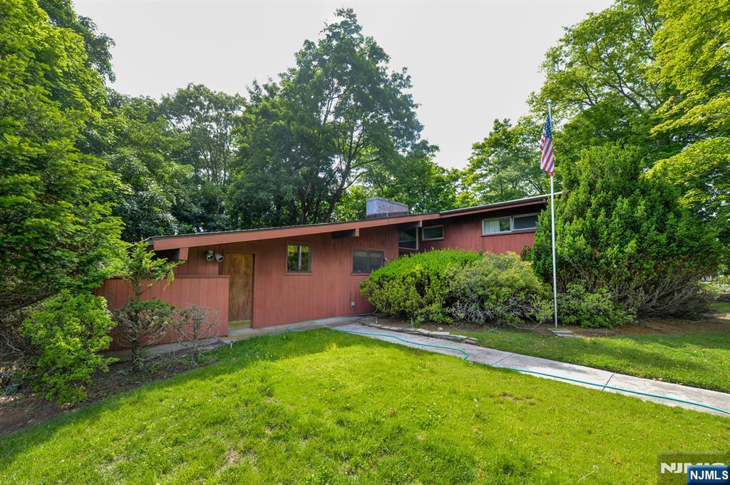 Offered for the first time in many years, this special Wyckoff home presents a rare opportunity to make it your own. A standout feature is the bonus suite with its own private entrance, four rooms, and a half bathâ€”once used as a dental office and now full of potential extra space for a rec room, a home office, or something uniquely suited to your lifestyle. Set on nearly 2/3 of an acre, the lush, wooded property offers privacy and plenty of possibilities. A large detached heated garage adds even more versatility. All of this in a convenient location just moments from the Brick House and Boulder Run Shopping Center. Come explore the possibilities and imagine the next chapter.