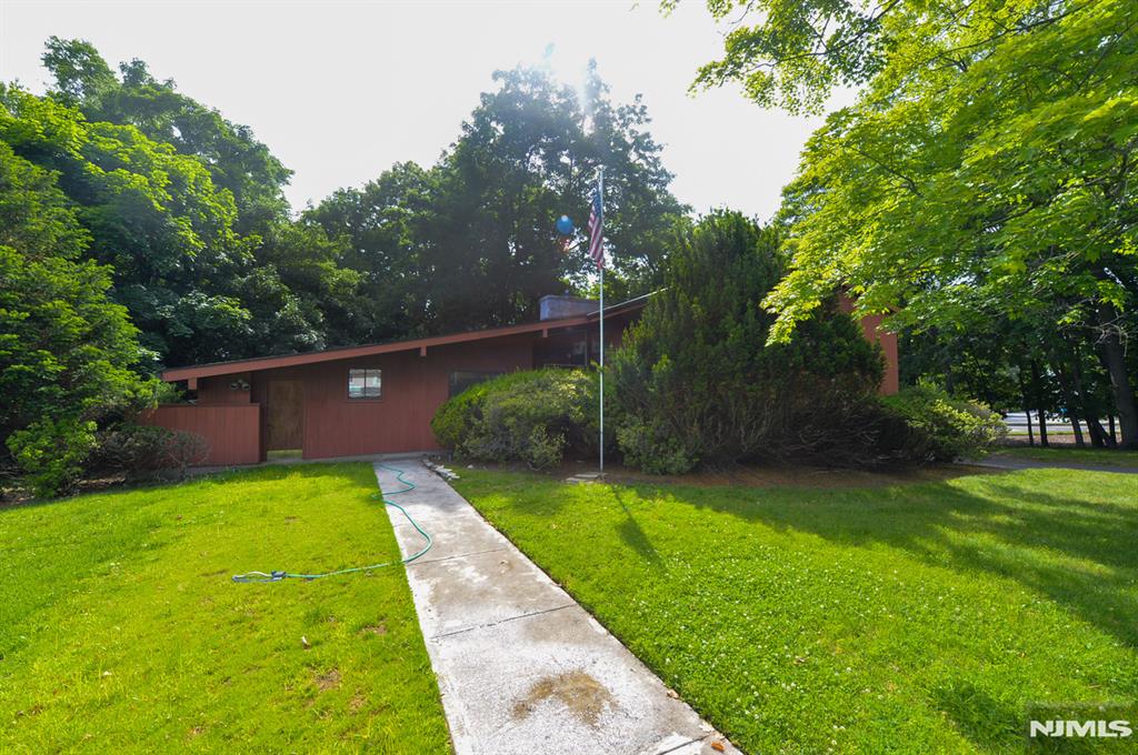 Offered for the first time in many years, this special Wyckoff home presents a rare opportunity to make it your own. A standout feature is the bonus suite with its own private entrance, four rooms, and a half bathâ€”once used as a dental office and now full of potential as space for extended family, a home office, or something uniquely suited to your lifestyle. Set on nearly 2/3 of an acre, the lush, wooded property offers privacy and plenty of possibilities. A large detached heated garage adds even more versatility. All of this in a convenient location just moments from the Brick House and Boulder Run Shopping Center. Come explore the possibilities and imagine the next chapter.
