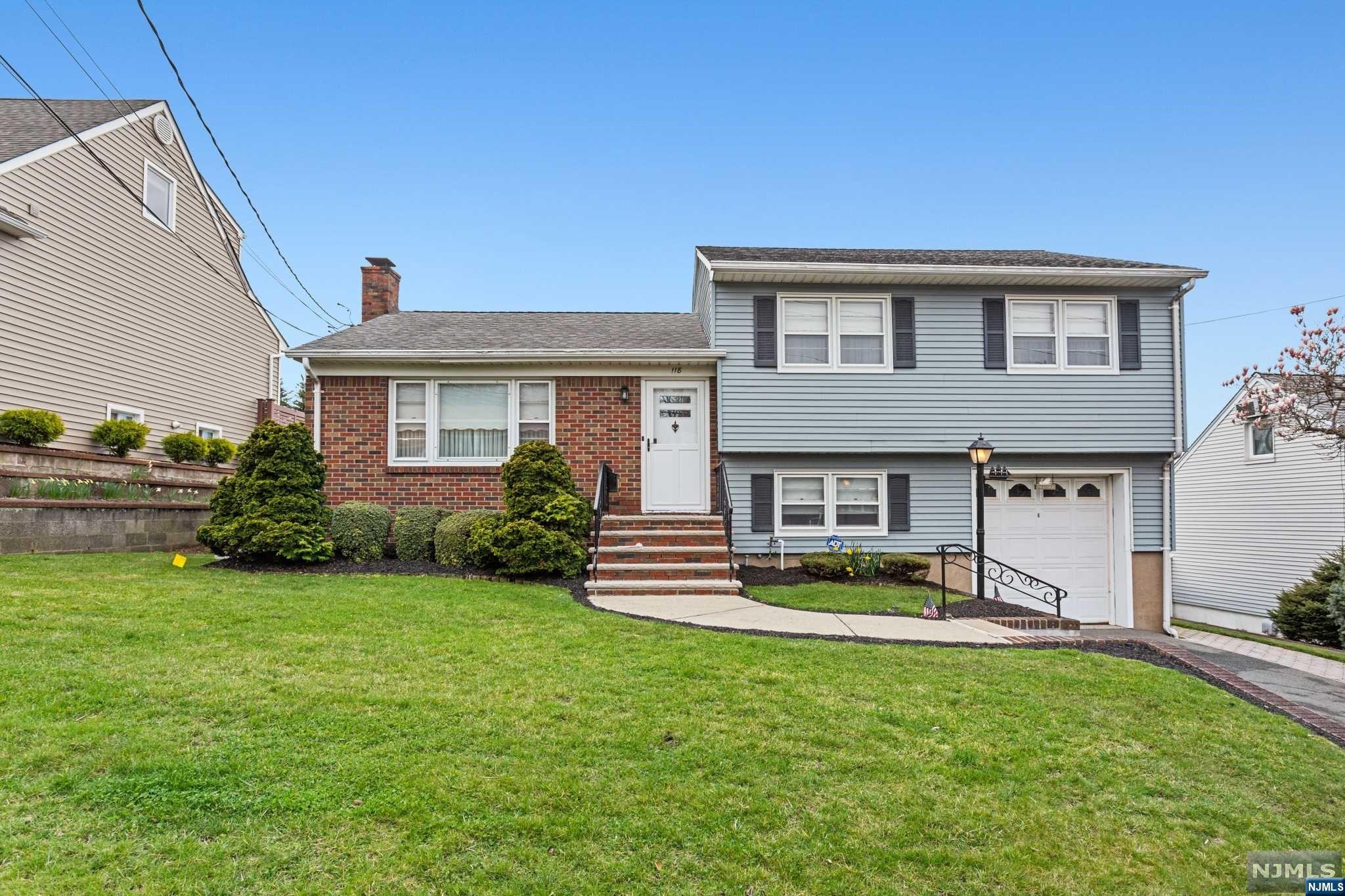 This Wallington Hill Section Home is waiting for you Close to schools, busses, 2 train stations and shopping, sits this 3 bedroom 2 1/2 Bath Split Level Offering a Large Living Room, Formal Dining Room, Eat In Kitchen, Master Bedroom With Master Bath, Next Level Offer Bonus Room/Office, Laundry, Sunroom that's Heated w/AC which leads to Beautiful Large Backyard, Finally the lower level offers a Fabulous Family Room w/Fireplace and Utility Room, This Beauty Also Offers Central AC, Attached 1 Car Garage, Driveway Parking for 2 Cars, Whole House Generator, Security and Irrigation System, Hardwood Under Carpets, Plenty of room for family, This is one you do not want to miss Not of a Flood Zone