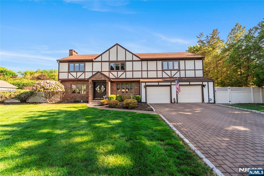 Welcome to this beautifully maintained residence nestled on a quiet street in the highly desirable town of Old Tappan. Offering a perfect blend of comfort, space, and timeless appeal, this home features an inviting layout designed for both everyday living and entertaining. Sun-filled interiors showcase spacious living areas, hardwood flooring, and large windows that fill the home with natural light. The kitchen offers ample cabinetry, generous counter space, and flows seamlessly into the dining and family areas. Spacious bedrooms provide comfort and flexibility, while the backyard offers a private setting ideal for outdoor gatherings, recreation, or relaxation. Conveniently located near top-rated Blue Ribbon schools, parks, shopping, dining, and major highways, this exceptional property presents a rare opportunity to enjoy suburban living in one of Bergen County's most sought-after communities.