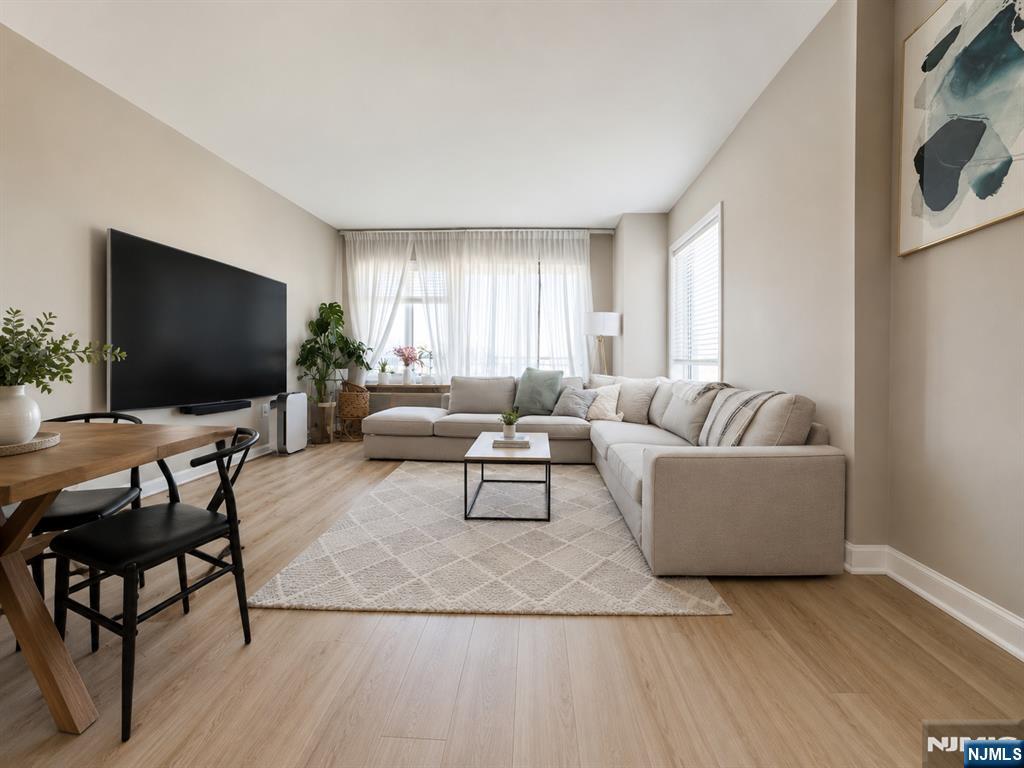Beautiful condo in City Place with stunning views of NYC! Walk into a large living room and dining room area with large windows throughout allowing tons of natural light in! The master bedroom is huge with a beautiful large master bathroom and a walk in closet. The second bedroom, large as well, includes plenty of closet space. There is a second finished bathroom in the unit. The kitchen is large, with plenty of cabinet space and updated appliances. The condo is located near so much shopping, great restaurants, fitness centers, and worship centers. The commute to NYC is only a few minutes with a short distance to the ferry, bus, or path! Stunning views, great location, perfect condo!