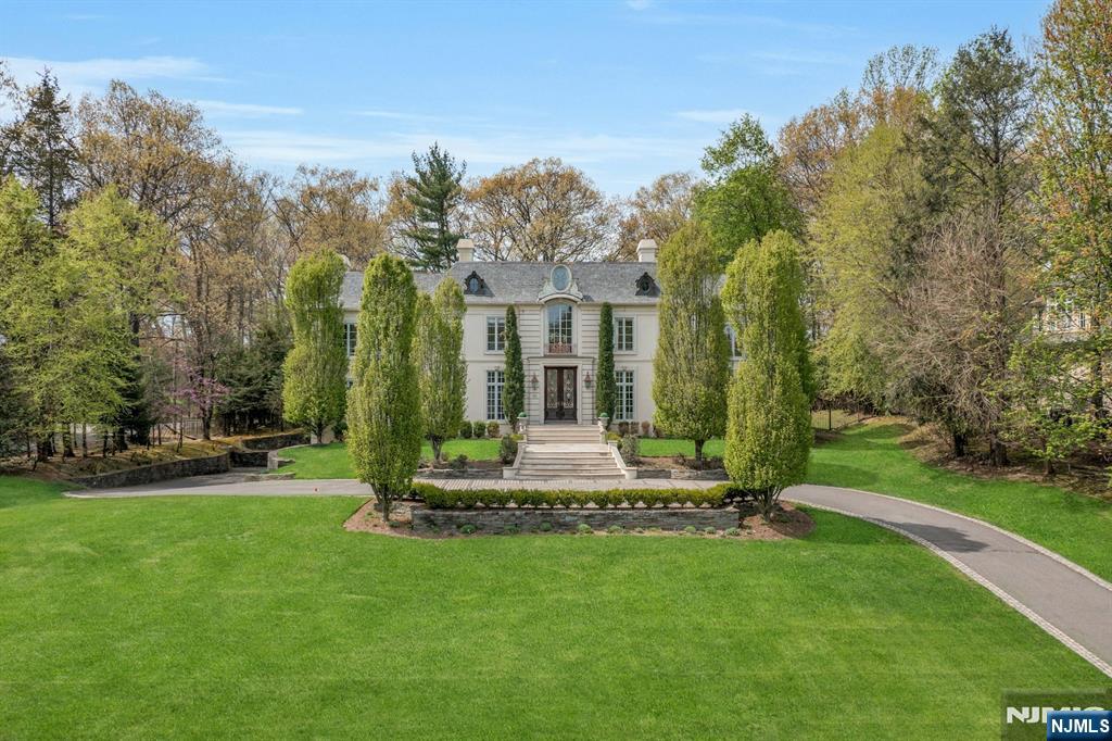 Why Travel to France when timeless French elegance can be yours every day? Welcome to an over 6000 sq ft masterpiece that brings the romance, refinement and artistry of French design to your doorstep. From the moment you arrive, this home evokes the charm of a countryside chateau blended seamlessly w modern luxury living. Architectural details include arched doorways, intricate millwork, and sun-drenched interiors from floor to ceiling windows create an atmosphere of sophistication. Every room tells a story: from the grand yet intimate living spaces to serene bedrooms that feel like a retreat. Tucked away on a cul de sac, built by a renowned local builder, including a wide open basement space with 10ft ceilings and a fully fenced property-This home is a lifestyle Where everyday feels like a getaway and the essence of France is your reality.