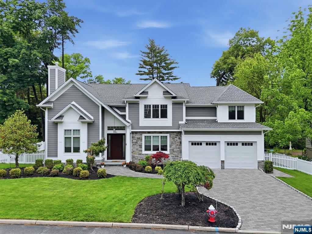 Experience luxury living in this stunning 9-year-young home built by one of Bergen Countyâ€™s most reputable local builders, located in wonderful Cresskill. From the moment you enter, you are welcomed by an abundance of natural light, a dramatic two-story foyer, and an impressive two-story living room with a gas fireplace and walls of windows. Designed for both entertaining and everyday living, the dining room with butlerâ€™s pantry flows seamlessly into the modern kitchen featuring quartz countertops, a center island with seating, breakfast nook surrounded by windows, and an open layout to the spacious family room. Sliding glass doors off the kitchen lead to the beautiful flat fenced yard with paver patios and a shed, creating effortless indoor-outdoor living. The 1st floor also offers 9-foot ceilings, built-in speakers, a beautiful powder room, and a convenient mudroom off the kitchen and garage. The 2nd level features a luxurious primary suite with tray ceilings, 2 walk-in closets, and a spa-like bath with soaking tub, oversized shower, and double vanity. A junior suite, 2 additional bedrooms connected by a Jack-and-Jill bath with double sinks and separate tub/water closet, and a 2nd floor laundry room complete this level. The bright lower level with 9-foot ceilings offers exceptional additional space including a recreation room with bar, gym, bedroom, full bath, and ample storage. A whole-house generator and incredible location complete this exceptional home.