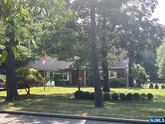 Four bedrooms and three bathrooms! First floor primary bedroom makes for convenient first floor living! Walking distance to park and Tenakill Middle School!
