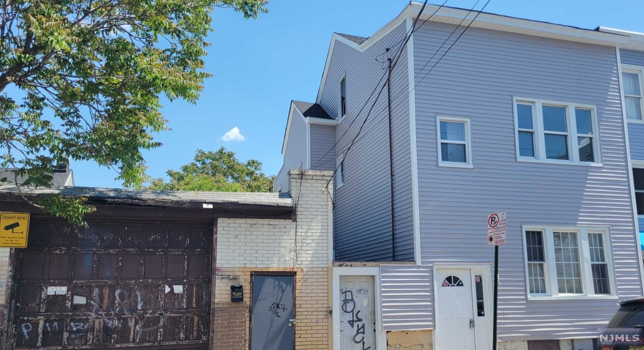 2 Family house fully renovated with hardwood floors. Fl 1 2 bedrooms FL 2, 3 bedroom. Off street parking.