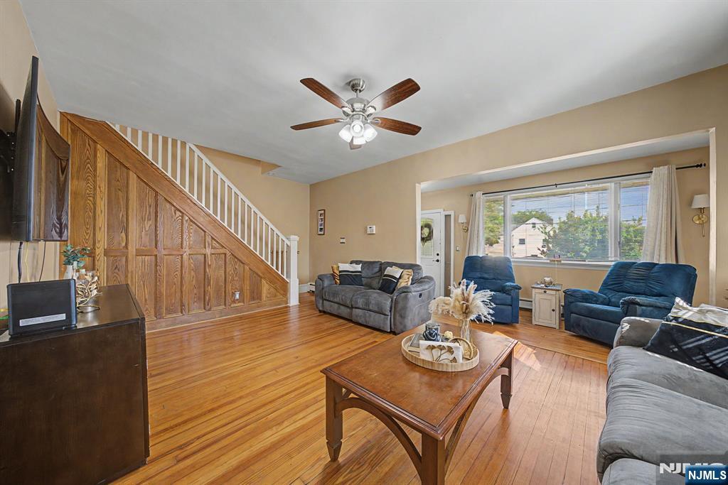 Charming move-in ready Cape Cod home with 2 bedrooms and 2 baths. Highlights include a finished basement with a family room and bonus room. Hardwood floors, walk-out, washer & dryer, a 2-car garage, and a beautiful paver patio. Close to schools and transportation. A must-see property!