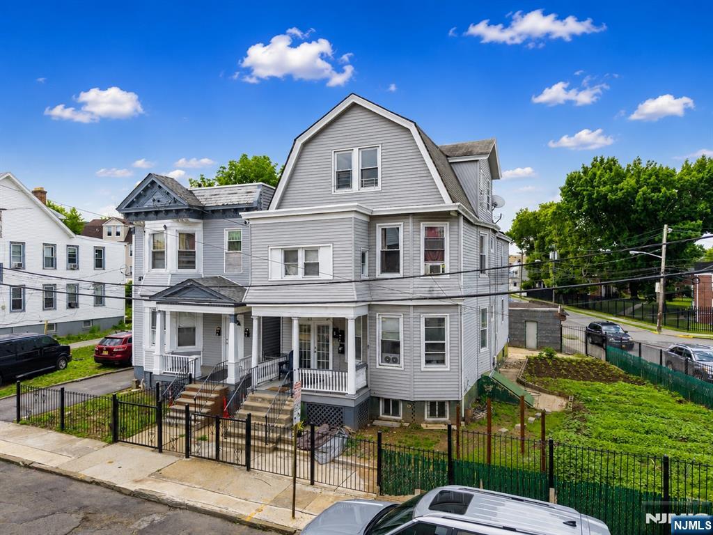This triplex at Irvington features 7 bedrooms and 4 bathrooms across 2,760 square feet of living space. The basement includes a full kitchen and bathroom. Property is fully occupied and each unit has separate utilities. The property is well-laid-out and conveniently located near schools, shopping, and transportation.