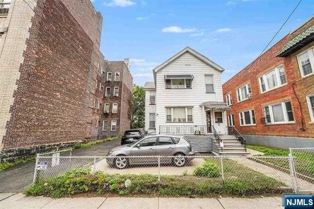 Discover a multitude of opportunities on this expansive 50X107 lot, perfect for crafting a four-story masterpiece, all thanks to the advantageous zoning regulations in place.This property entices you with its allure and potential, inviting you to envision converting it into an eight (or more) unit dwelling. Bring along your architect and your aspirations. Nestled on one of the most coveted streets in the Heights, residents appreciate the proximity to acclaimed dining establishments such as Corto and Bread & Salt. Riverview Fisk Park, offering breathtaking views of NYC and a vibrant farmer's market, is just a stone's throw away. Moreover, convenient access to New York City is at your fingertips with the Light Rail station just a quick 3-minute stroll away, and the NJ Transit bus stopping right outside your front door.