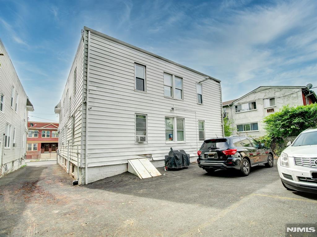 Charming multifamily property in Newark's desirable Weequahic neighborhood. Built in 1923, this well-maintained building offers spacious residences, updated interiors, separate utilities, ample parking, and a detached garage. Conveniently located near parks, shopping, transportation, and major commuter routes, it presents an excellent opportunity for investors seeking strong rental appeal in a prime location.