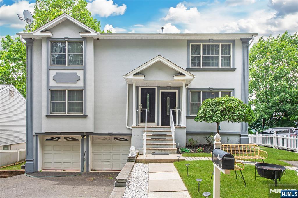 Built in 2005, this modern, well maintained two family home offers a rare opportunity to own newer construction with two spacious 3 bedroom, 2 bathroom apartments, making it equally appealing for those looking to live in one unit or generate rental income from both. Each apartment features a comfortable layout with a bright living room, eat in kitchen, primary bedroom with a private full bathroom, two additional bedrooms, and in unit laundry. The first floor apartment features luxury vinyl plank flooring, an updated kitchen with white cabinetry, granite countertops, and newer glass top appliances. Just off the kitchen, a deck overlooks the above ground pool, creating a great outdoor space. The finished basement adds valuable living space for recreation, along with laundry and direct access to the attached two car garage. The second floor apartment offers tile flooring in the main living areas, carpeted bedrooms, pull down attic access for additional storage, and in unit laundry. The standout features of this property is the amount of parking. In addition to the oversized attached two car garage, there is a three car wide driveway, parking for up to seven vehicles, including a parking space along the side of the home. Each apartment has its own gas, electric, hot air heating, and central air . Located near shopping, restaurants, parks, major highways, and public transportation, this is an excellent opportunity to own a newer two family home with outstanding parking.
