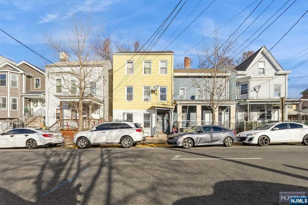 Welcome to your opportunity to own a multi-family investment property in Paterson NJ. This home is deceiving in the fact that it is much larger then it appears. Each unit features one bedroom or two depending on the arrangement. Lets not forget the bonus 2 rooms in the attic and the basement which already has a street entrance and a back exit. Whether you are looking to buy your first home and have assistance from the other units or looking to make this strictly an investment, this home has great potential.
