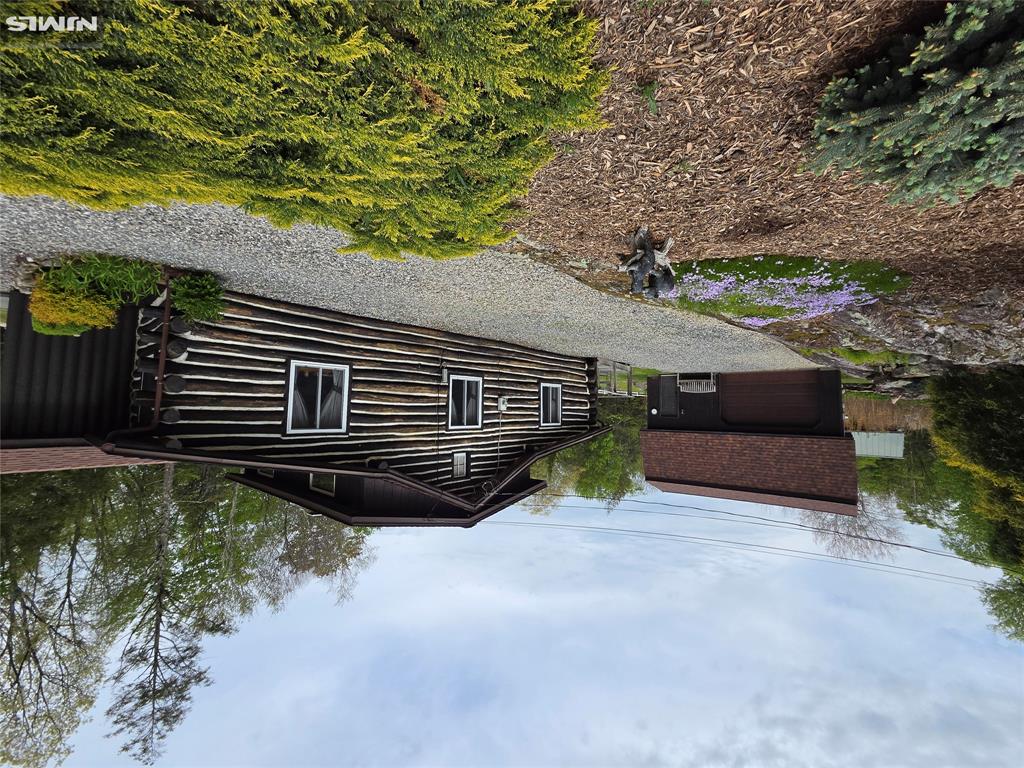 etreat or full time residence- or a combination of both! This well maintained log home with a huge detached garage has so many possibilities. Part of the Lk Lookover community and walking distance to Wawayanda State Pk makes this an ideal property for nature lovers. Imagine walking out your back door to access the state park for yr round hiking or winter sports or enjoying a refreshing dip in pristine Lk Lookover fed from a stream running through the watershed hills and meadows! The property itself shows off natures artwork with the rock formation running alongside of the property- filled with blooming perennials. Another rock wall forms the southwestern boundary. A foyer welcomes your guests as they admire the chestnut log interior complete with log beams and original woodwork. And of course, a natural stone wood burning frplc for added ambiance. 2 BR, a modern tiled bth and a kit outfitted w granite ctrs complete the main level. A log stairway leads to the open loft area perfect for extra guests, work or relaxation space. Back dnstrs, the kit leads out to a private deck allowing for E/W/S views. The coup de resistance is the over sized 2 story garage with so many options! Electric and heat allow this to be an all season space- perfect for storing your vehicles and toys and tinkering. A stairway leads to the full 2nd level waiting for you to create that private bonus room- imagine the possibilities! an hr from NYC with endless recreation and entertainment options. INTERIOR