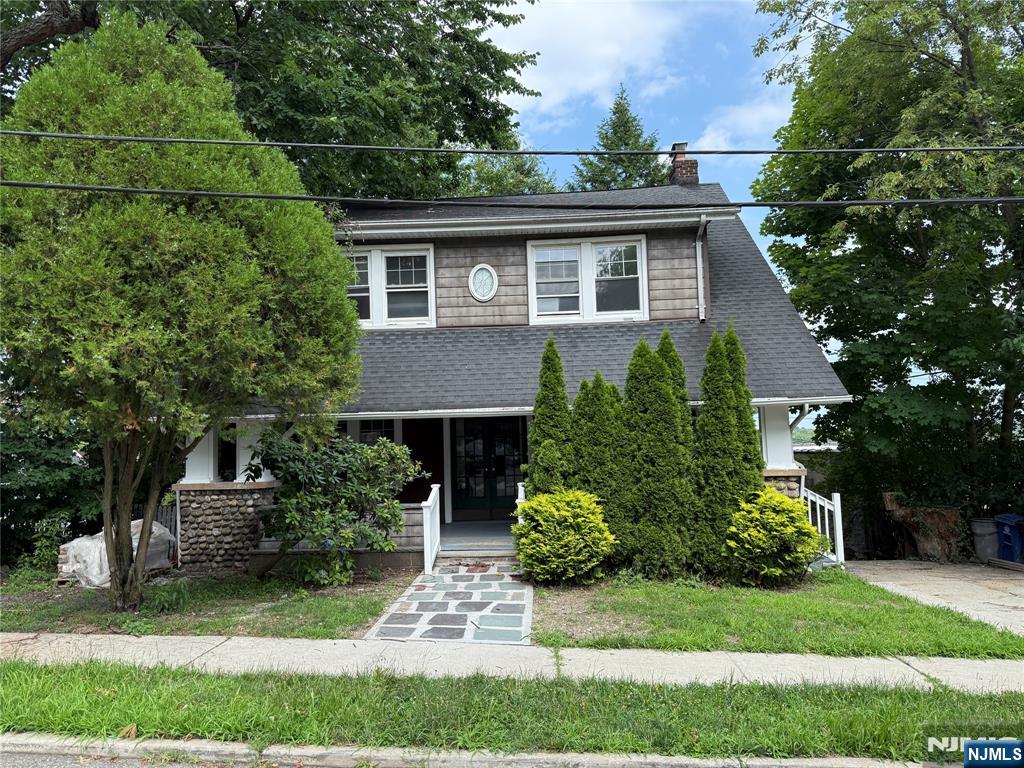 Charm Meets Prime Location! Nestled on a quiet, highly convenient side street, this classic Colonial boasts exceptional period details and incredible potential. Featuring a welcoming open front porch, 4 generous bedrooms, and 3 full bathrooms, this property is being sold "as-is"â€”offering a fantastic opportunity to bring your own vision to a structurally character-rich home. A Commuterâ€™s Dream, located just minutes from the GWB for a stress-free drive into the city. NJ Transit bus stops are located within just one block of your front door. Highly regarded, top-tier public school systems. You are within short walking distance to a diverse array of downtown dining spots, local cafes, boutique shops, and daily shopping essentials.