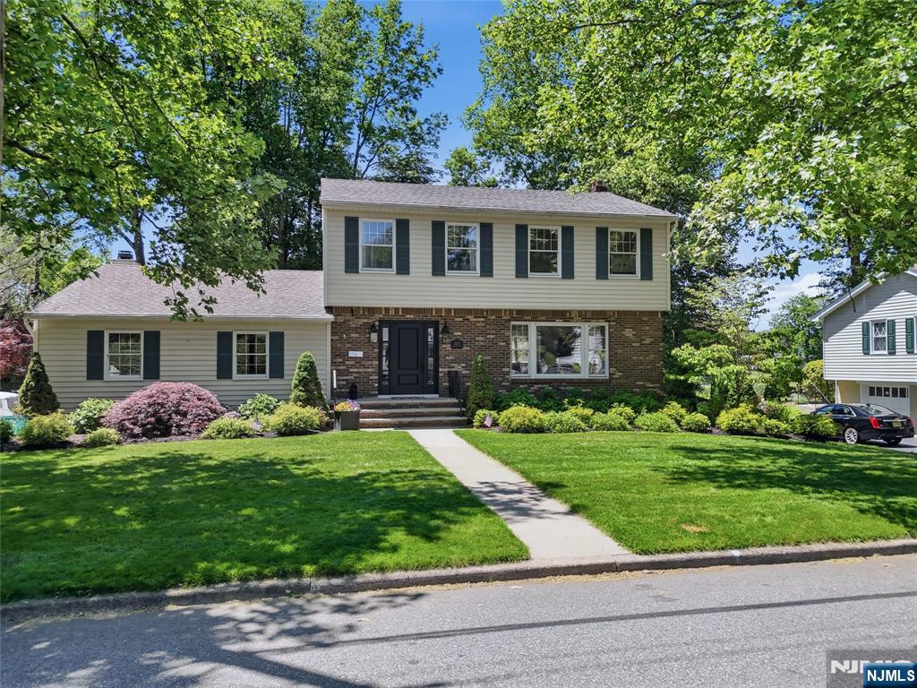 Stunning renovated Colonial overlooking beautiful Schlegel Lake in the heart of Washington Township. This 4-bedroom, 2.5-bath home is set on a quiet, tree-lined street within walking distance to the town center, offering both privacy and convenience. The thoughtfully updated interior features bright, spacious living areas, tasteful modern upgrades, and timeless design throughout. The expansive primary suite offers a private en-suite bath, while the additional bedrooms provide flexibility for guests, family, or work-from-home needs. A full finished basement adds exceptional bonus living space, ideal for recreation, a media room, gym, or home office. Completing the home is an attached 2-car garage for added convenience and storage. A rare opportunity to enjoy tranquil lakefront living in one of Washington Townshipâ€™s most sought-after locations.