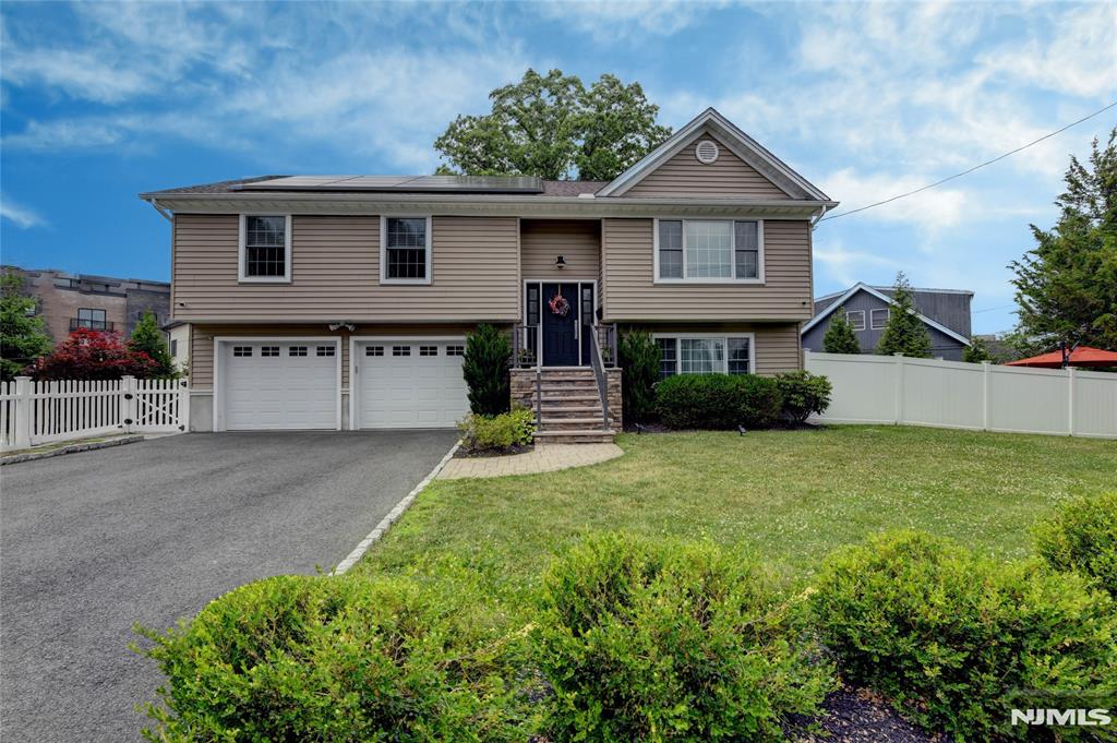 MOVE RIGHT IN TO THIS BEAUTIFULLY MAINTAINED 2017 BUILT 4 BDRMS, 3 BATH HOME FEATURING 2 PRIVATE SUITES INCLUDING A GROUND LEVEL SUITE WITH FULL BATH, OFFICE AREA AND BACKYARD ACCESS, THE OPEN CONCEPT FLOOR PLAN OFFERS A QUARTZ KITCHEN WITH ACCESS TO DECK, NATURAL GAS GRILL HOOKUP, PATIO, MATURE LANDSCAPING AND FIRE PIT, ENERGY EFFIECIENT TESLA SOLAR SYSTEM WITH 39 PANELS & 3 POWER WALLS PROVIDES SIGNIFICANT SAVINGS & WHOLE HOMEMBACKUP POWER, OVERSIZED 2 CAR GARAGE, EV CHARGER, VIVINT SMARK HOME SECURITY, NAVIEN TANKLESS WATER HEATER, NEWER WASHER/DRYER, A RARE COMBINATION OF MODERN CONSTRUCTION, SMART TECHNOLOGY & TURNKEY CONVENIENCE IN A SOUGHT AFTER LITTLE FALLS LOCATION--CAMERA OUTSIDE & IN GARAGE-HOT TUB & SUANA ARE EXCLUDED BUT NEGOTIABLE