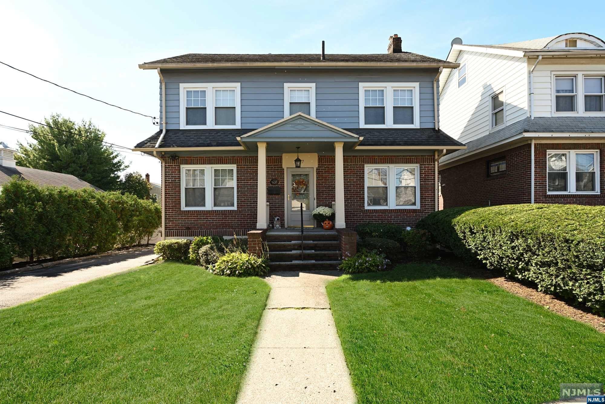 Beautiful bright and sunny 4 bedroom 2.5 bath colonial located in the Spring Garden section of town. Spacious rooms with hardwood floor, fireplace and updated kitchen. Finished basement with storage and laundry room. Two car garage and spacious driveway with fenced in backyard. Near transportation to New York City, short distance to shops, restaurants and parks.