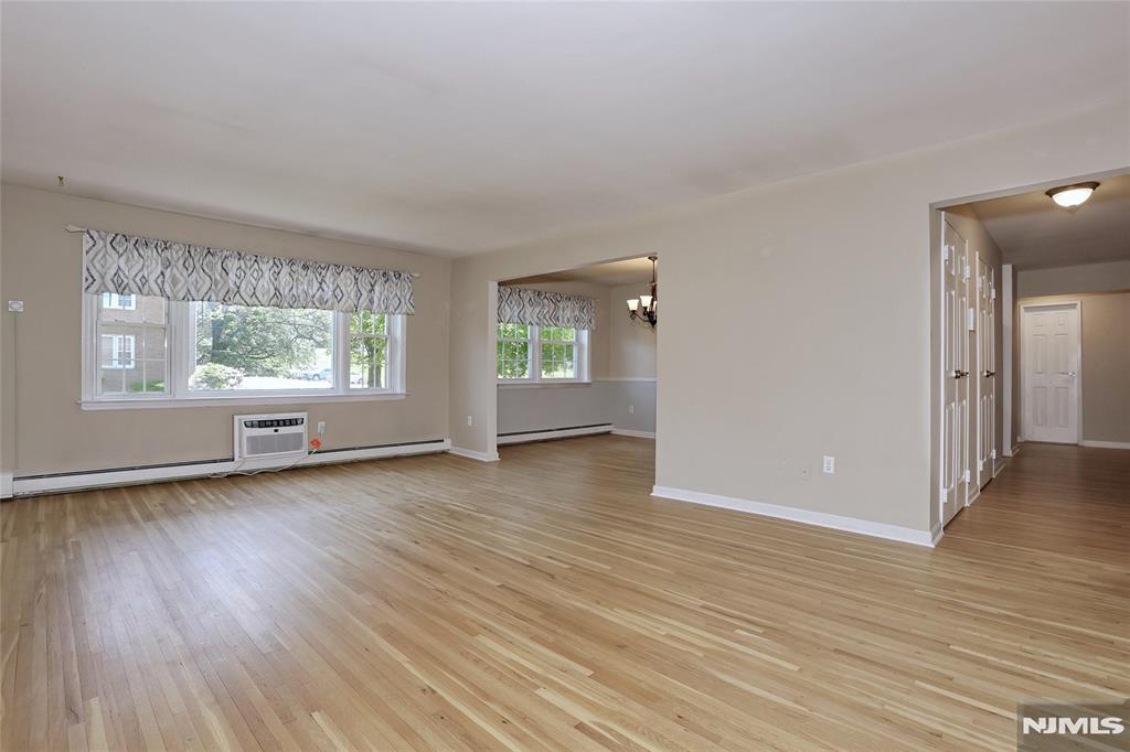 Nestled in a beautiful residential neighborhood near the Montclair border, Williamsburg South has much to offer. Amenities include impeccably maintained grounds, a picnic area with tables and grills and a sparkling in ground pool. Unit 2C is the largest model in the complex at just over 1,000 square feet. This end unit is filled with light in all rooms. Featuring a spacious living room, formal dining room with the potential for a 2nd bedroom and pristine kitchen with dining area. The main bedroom is large enough to accommodate a king sized bed as well as having three closets. There are double sinks in the bathroom, a tub with shower, triple mirror medicine cabinet and linen closet. You will also find two large entry closets as you enter the unit. Laundry is located in the building as well as a private 4x7 storage unit. Maintenance includes heat/hot water and gas. Residents only pay electric, cable/WiFi. Williamsburg South is located in close proximity to the GS parkway, Rt 3 and Rt 46 providing excellent access to NYC. There is no smoking anywhere inside or outside the buildings. Rental allowed after two years of ownership and subject to a wait list.